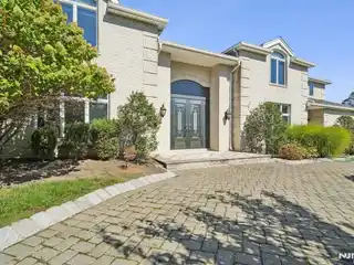 All-Brick Center Hall Colonial in the Coveted North Cliffs