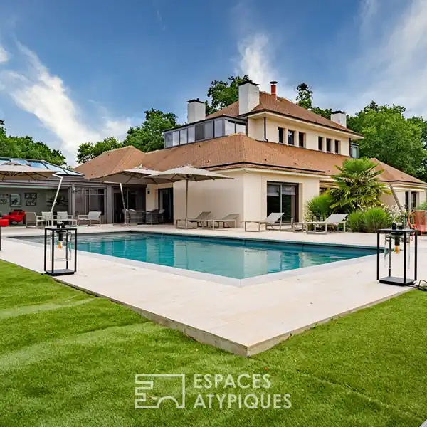 ARCHITECT-DESIGNED HOUSE IN GREEN SETTING