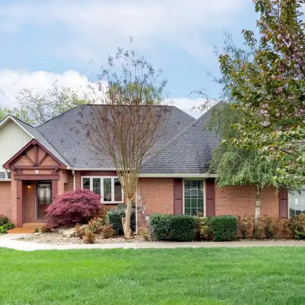STUNNING ALL-BRICK GOLF COURSE HOME WITH SCENIC VIEWS