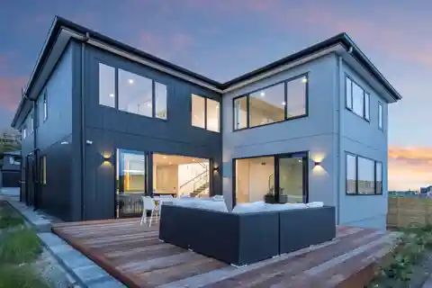 Architectural Coastal Haven with Soaring Cathedral Ceilings