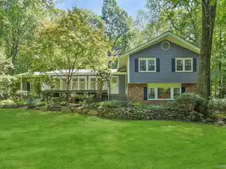 Striking Frame and Brick-Front Split-Level Home