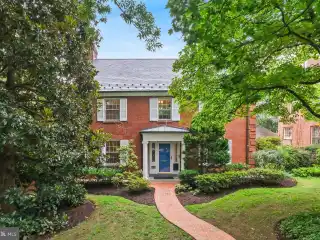 Stately Brick Colonial with Serene Backyard Retreat