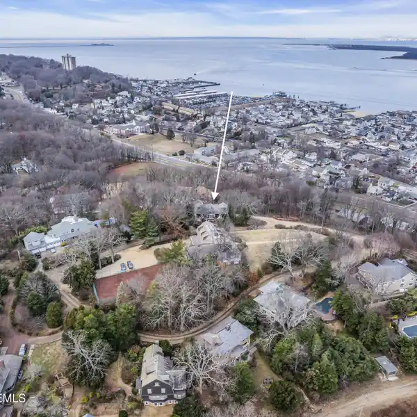 STUNNING COLONIAL REVIVAL WITH STATELY DESIGN FEATURES