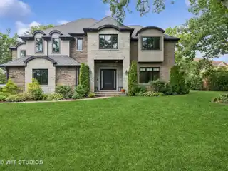 Elegant Brick & Stone Estate on Secluded Grounds