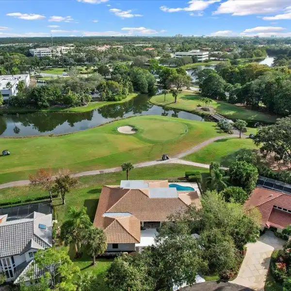 EXCEPTIONAL POOL HOME WITH GOLF COURSE AND LAKE VIEWS