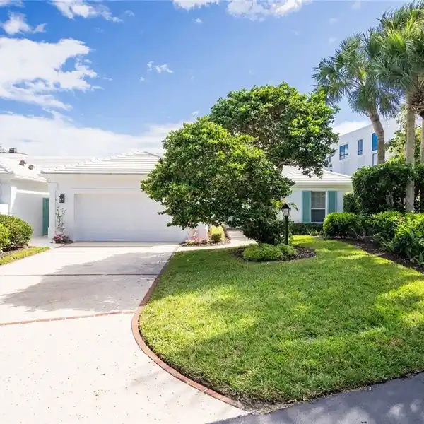BERMUDA-STYLE ELEGANCE IN A PRIVATE COASTAL ENCLAVE