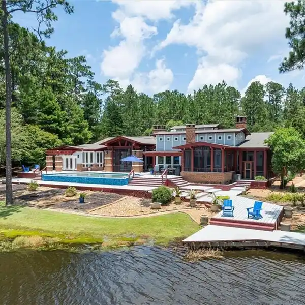 ARCHITECTURAL LAKEFRONT MASTERPIECE WITH INFINITY POOL