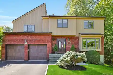 Contemporary Colonial in a Park-Like Setting