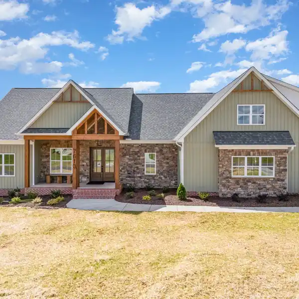 DESIGNER HOME WITH GRAND PORCH AND LUXE FINISHES