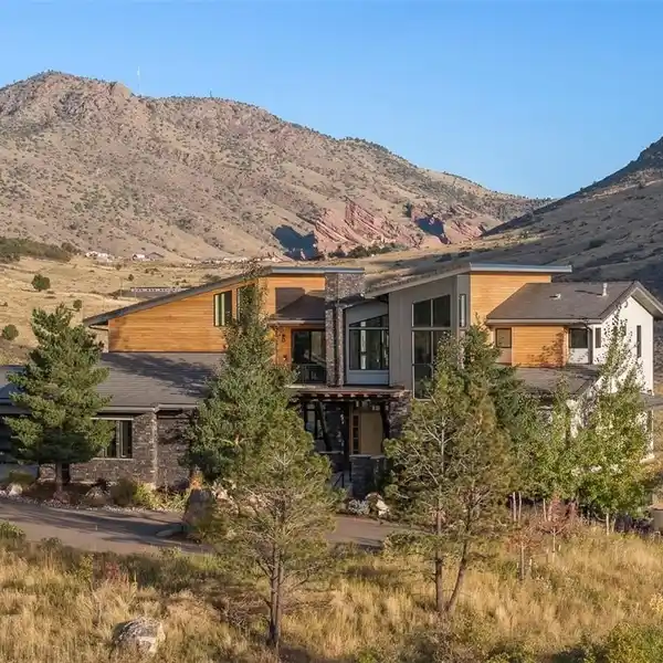CUSTOM HOME WITH EXPANSIVE OUTDOOR LIVING SPACE