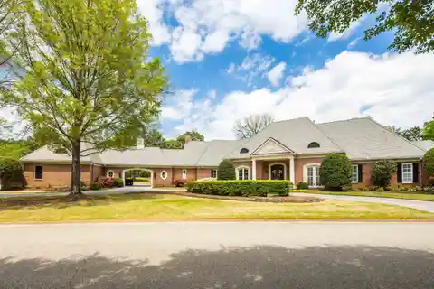 Beautiful and Expansive Brick Home with Pool