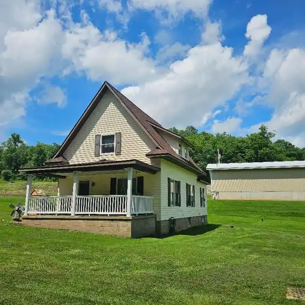 COUNTRY LIVING WITH VERSATILE ACREAGE