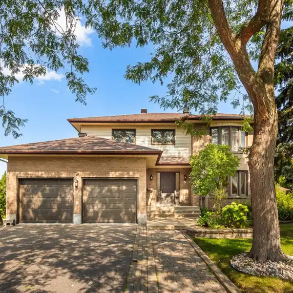 METICULOUSLY MAINTAINED GRILLI HOME WITH LARGE DECK