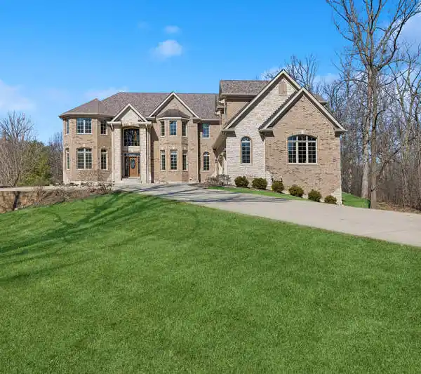 EXTRAORDINARY ALL-BRICK AND STONE CUSTOM HOME