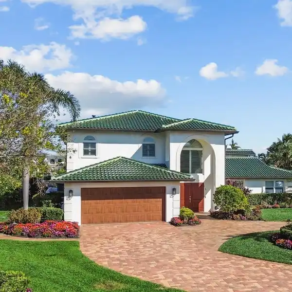 EXECUTIVE STYLE HOME ON DEEP WATER IN VENETIAN ISLES