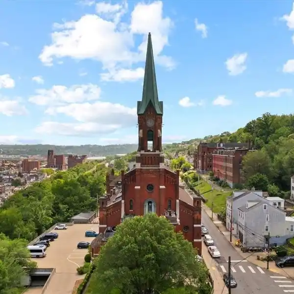 UNIQUE HISTORICAL RESIDENCE HOUSING A CLOCK TOWER