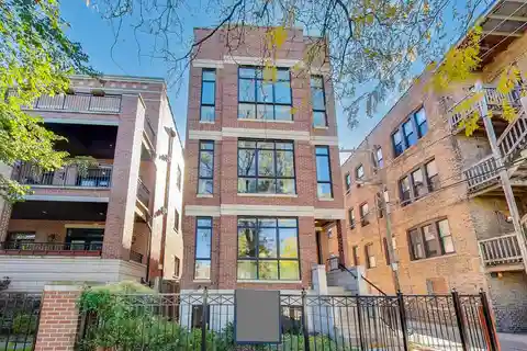 Exquisite Brick Duplex with Sophisticated Entertaining Spaces