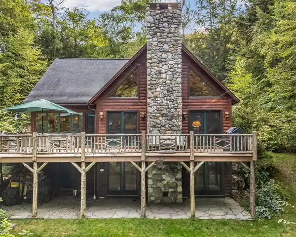 RARE LOG HOME ON GREAT POND