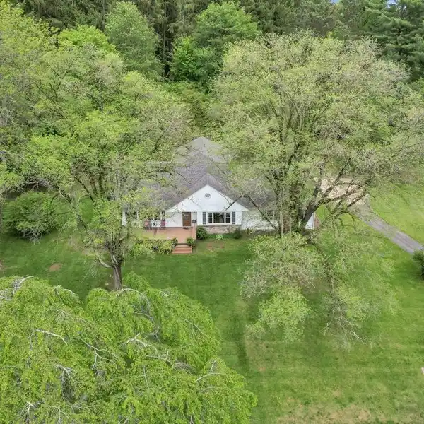 ELEGANT CUSTOM HOME ON 9+ PRIVATE ACRES
