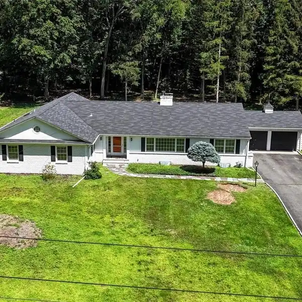 CLASSIC RANCH HOME IN AN EXCEPTIONAL SETTING