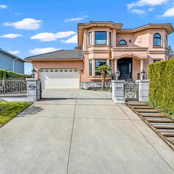 CUSTOM CORNER LOT HOME IN GARDEN VILLAGE