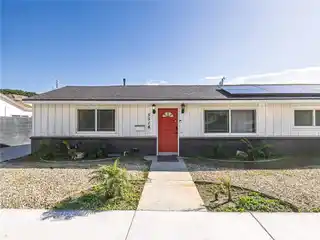 Modern Living with Solar Panels and Large Yard