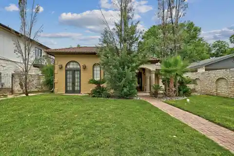 Mediterranean Lake Austin Bungalow with a Private Boat Dock