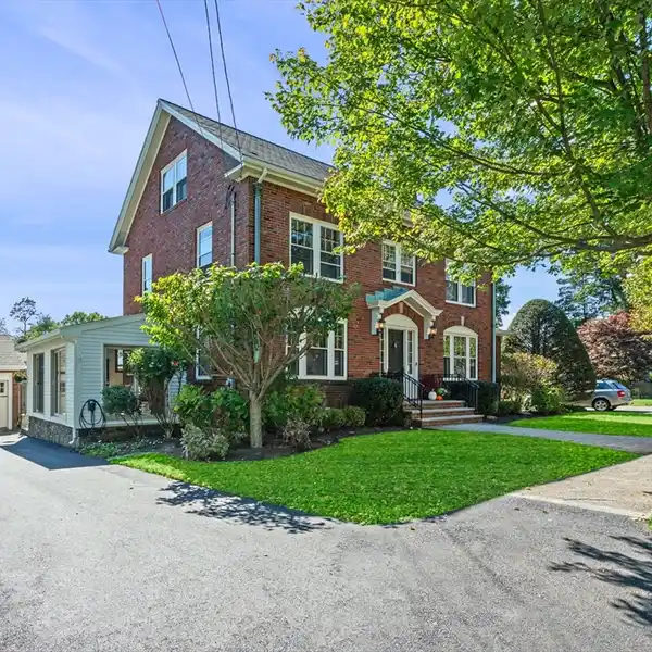 STATELY BRICK COLONIAL IN THE BEACH BLUFF AREA