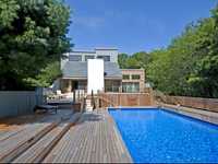 NEWLY REMODELED HOME WITH MULTI-LEVEL SUN DECK AND POOL