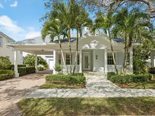 Single-story with Sweeping Water and Golf Views