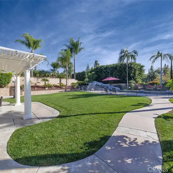 ELEGANT FORMER MODEL HOME WITH RESORT-STYLE BACKYARD