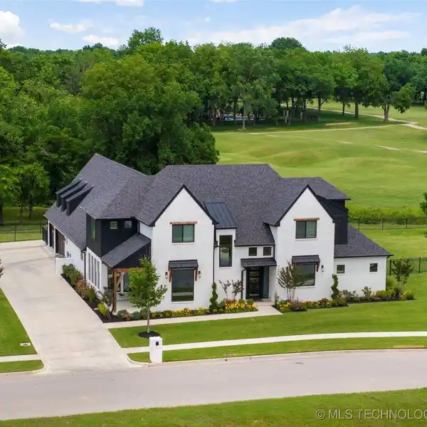 UPSCALE HOME WITH STUNNING YEAR-ROUND OUTDOOR SPACES