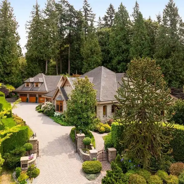 MAGNIFICENT GATED STONE MANSION