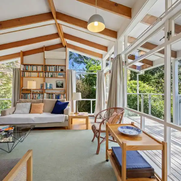 MID-CENTURY LIGHT-FILLED RETREAT WITH VAULTED CHARM