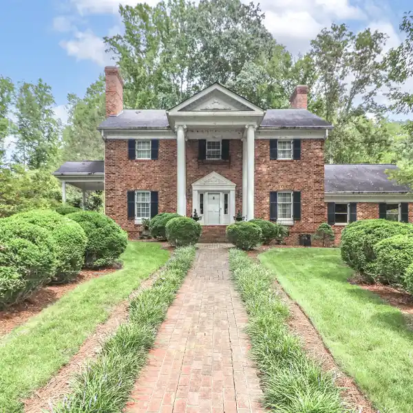 ELEGANT HOME ON THREE-PLUS ACRES IN THE STATESVILLE COUNTRY CLUB