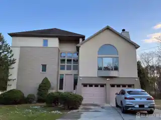 Three-Story Colonial with Flexible Living Spaces