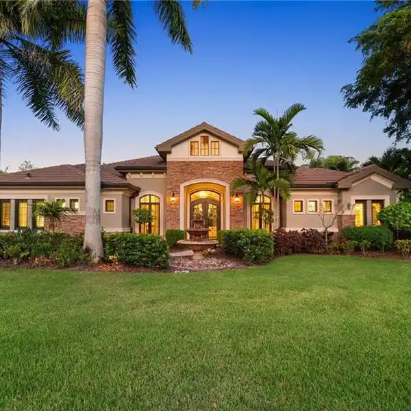 GRAND COVERED PORTICO WITH DUAL GARAGES