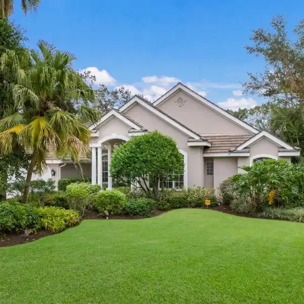 DISTINCTIVE CUSTOM HOME IN GATED UNIVERSITY PARK COUNTRY CLUB