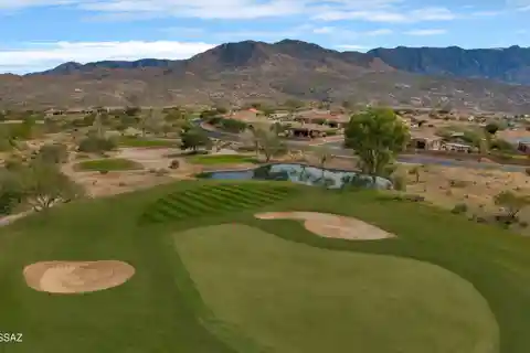 Highly Upgraded Home with Sweeping Golf and Mountain Views