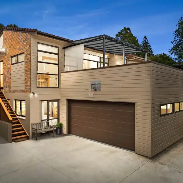 ELEVATED FAMILY RETREAT WITH EXPANSIVE SUNLIT DECKS