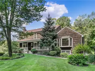 Beautiful Colonial on Nearly Three Park-like Acres