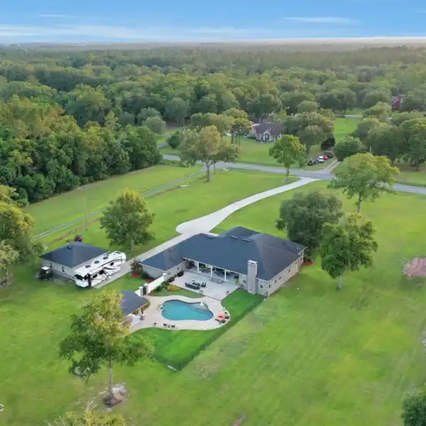 LUXURIOUS POOL HOME ON FIVE-PLUS ACRES