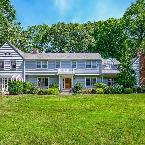EXCEPTIONAL COLONIAL ON A PRIVATE 0.58-ACRE LOT