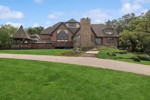 Versatile Estate on Private Acreage with Views