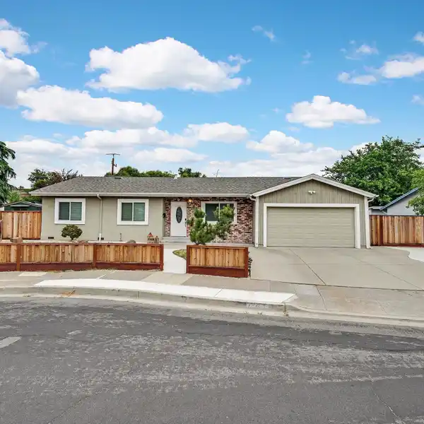 UPDATED HOME IN QUIET DESIRABLE NEIGHBORHOOD