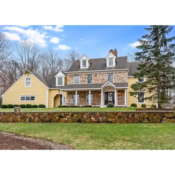 BEAUTIFULLY UPDATED AND EXPERTLY EXPANDED FIVE BEDROOM HOME