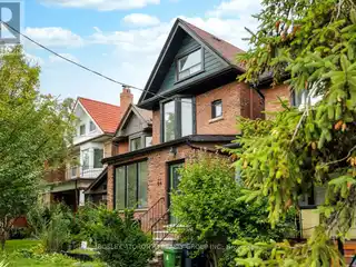 Quintessential Family Home with Backyard and Garage Parking