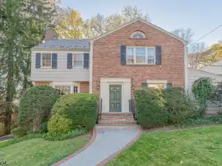 Tastefully Curated Classic Center Hall Colonial