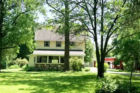 Charming Acreage with Barn and Art Studio