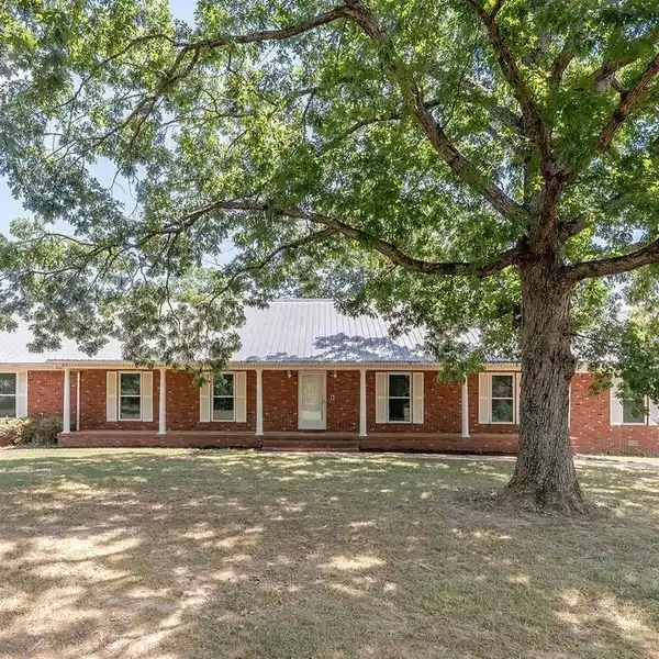 EXPANSIVE 25-ACRE HOMESTEAD WITH POOL AND ORCHARD